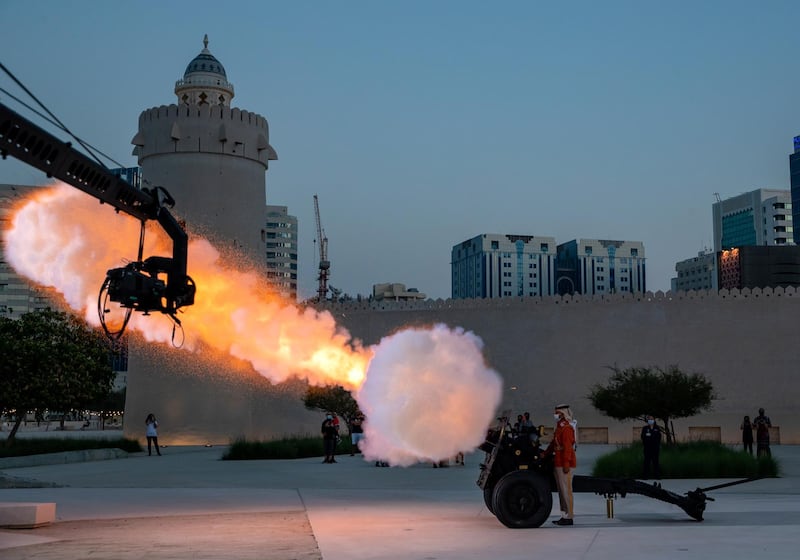 Abu Dhabi, United Arab Emirates, April 20, 2021.  Abu Dhabi’s oldest standing building, Qasr al Hosn, performs the tradition canon firing to mark the beginning of iftar.
Victor Besa/The National
Section:  NA/Standalone/Big Picture