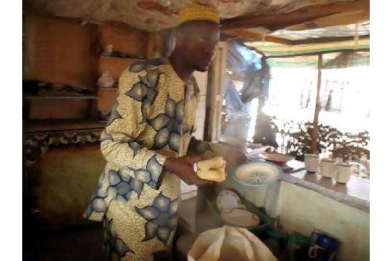 The omelette seller at the Nigeria-Benin border.