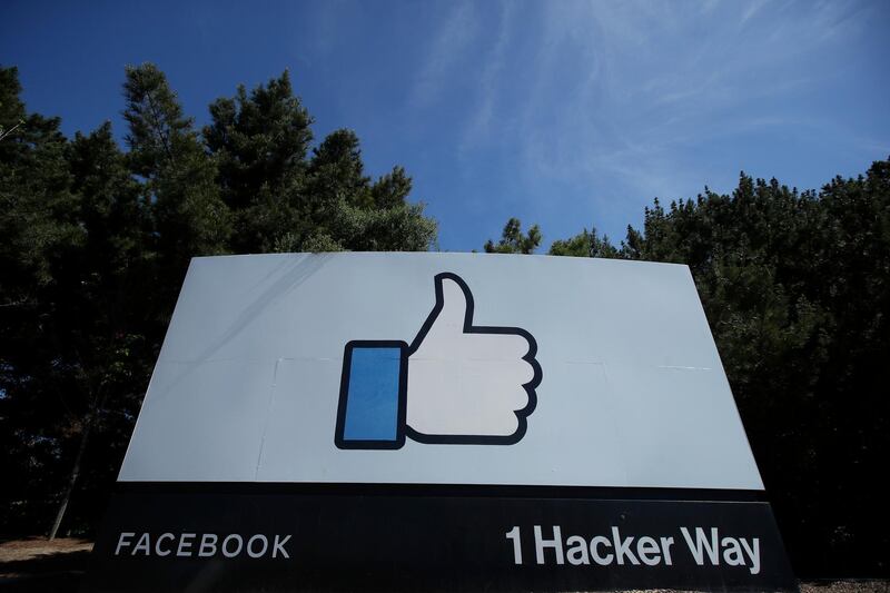 FILE - In this April 14, 2020 file photo, the thumbs up Like logo is shown on a sign at Facebook headquarters in Menlo Park, Calif.  Facebook said Tuesday, Sept. 1 that it removed a small network of accounts and pages linked to Russia's Internet Research Agency, the â€œtroll factory" that has used social media accounts to sow political discord in the U.S. since the 2016 presidential election.  (AP Photo/Jeff Chiu, File)