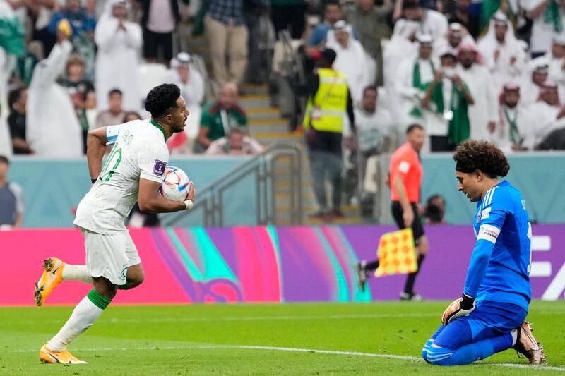 Saudi Arabia's Salem Al Dawsari runs back with the ball after scoring against Mexico. AP