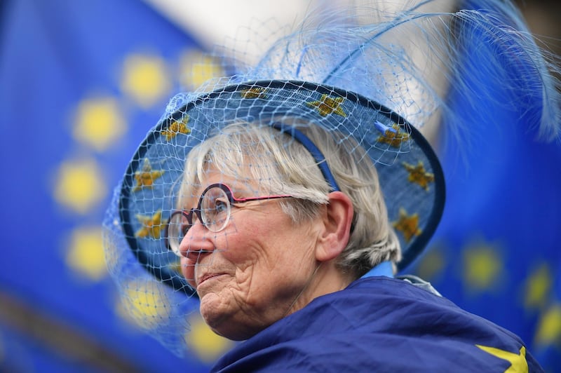 An anti-Brexit campaigner protests outside the Houses of Parliament in London Getty Images