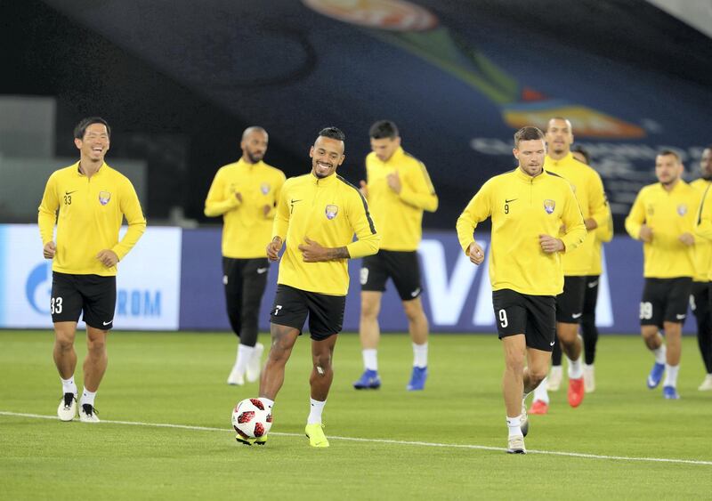 Abu Dhabi, United Arab Emirates - December 21, 2018: Marcus Berg (9) and Caio (7) of Al Ain train ahead of the Fifa Club World Cup final. Friday the 21st of December 2018 at the Zayed Sports City Stadium, Abu Dhabi. Chris Whiteoak / The National