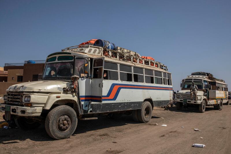 Tigray refugees who fled the conflict in the Ethiopia's Tigray, ride buses enroute to Qadarif to seek refuge at Hamdayet Transition Center, eastern Sudan. AP Photo