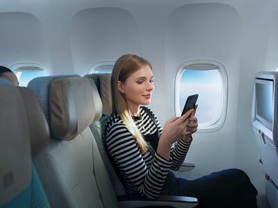 Most passengers put their phones on flight mode in the air but some passengers ignore calls to do so. Courtesy Emirates