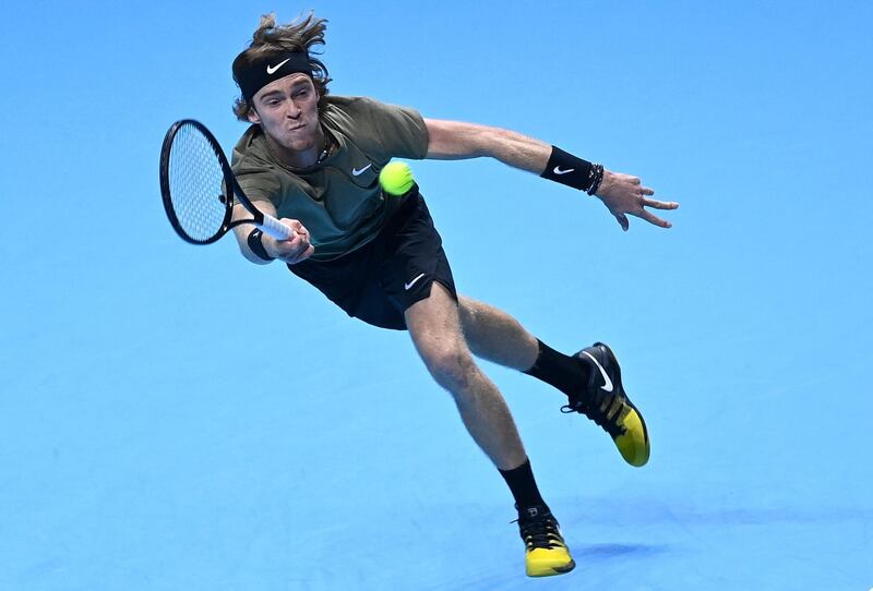 Andrey Rublev returns to Rafael Nadal at the ATP Finals in London. EPA
