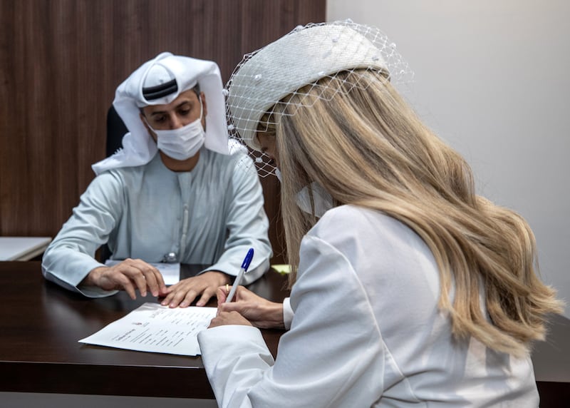 The Abu Dhabi Civil Family Court has has registered more than 12,000 marriages since 2021. Victor Besa / The National