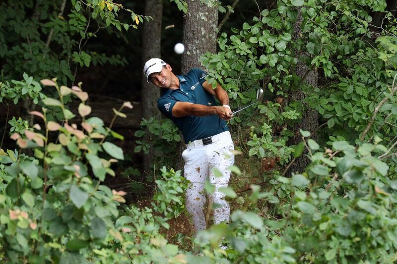 Jason Day of Australia plays a shot on the fifth hole during the second round of the Deutsche Bank Championship at TPC Boston in Norton, Massachusetts. David Cannon / Getty Images / AFP