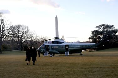 US President Donald Trump and first lady Melania Trump depart the White House to board Marine One ahead of the inauguration of president-elect Joe Biden, in Washington. Reuters