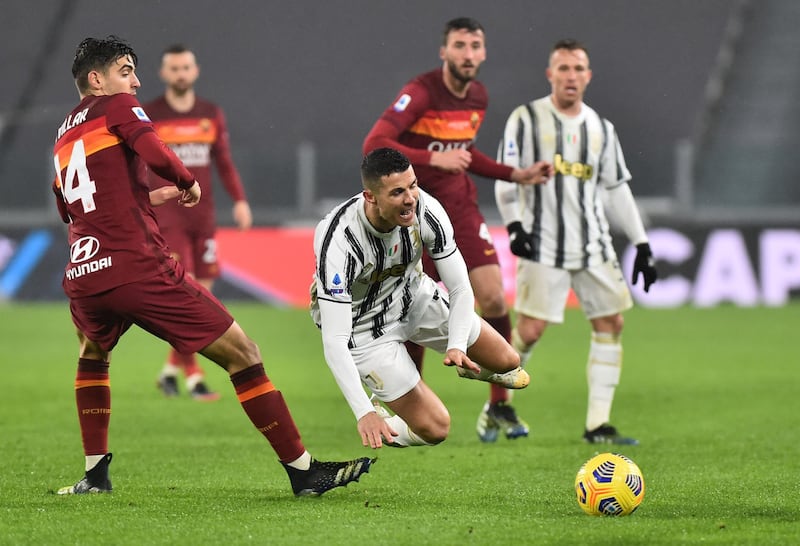 Cristiano Ronaldo is fouled by Roma's Gonzalo Villar. Reuters