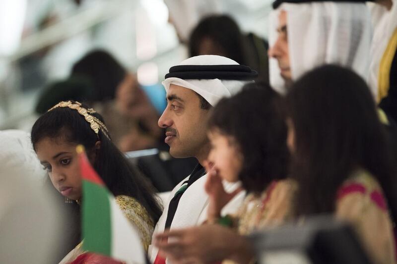 Sheikh Abdullah bin Zayed, Minister of Foreign Affairs (2nd L) and Sheikha Fatima bint Abdullah (L), attend the 44th UAE National Day celebrations held at Zayed Sports City. Mohamed Al Suwaidi / Crown Prince Court - Abu Dhabi