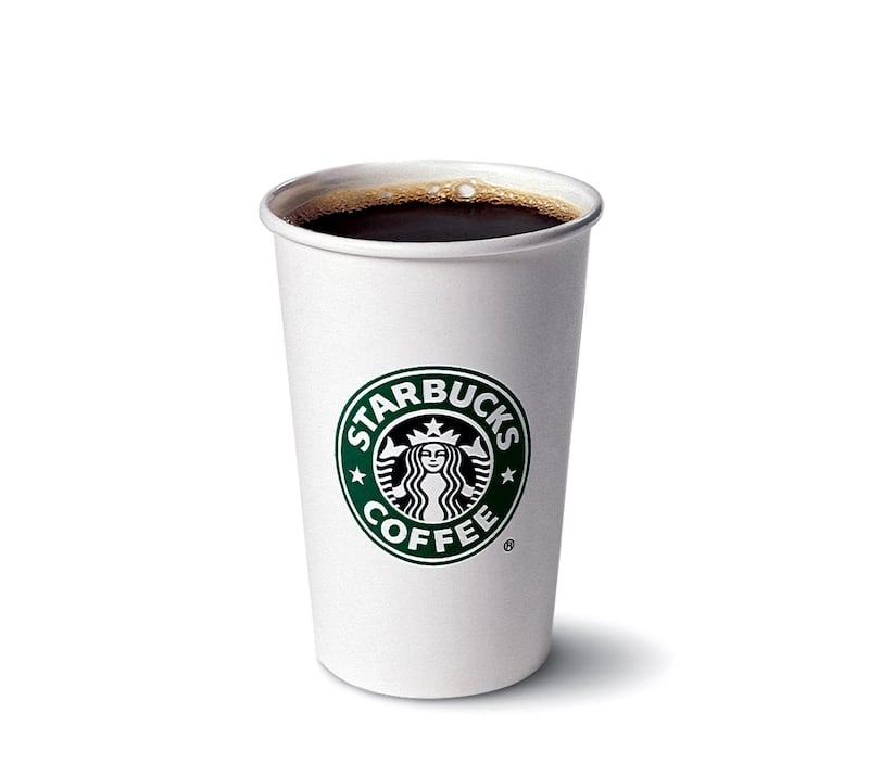 a starbucks cup of coffee. paper cup of coffee
CREDIT; Courtesy Starbucks