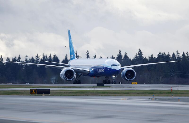 The Boeing 777X airplane taxis back after a cancelled first test flight from the company's plant in Everett, Washington on  Friday, January 24, 2020. The test flight was postponed for a second day in a row due to the weather. Reuters