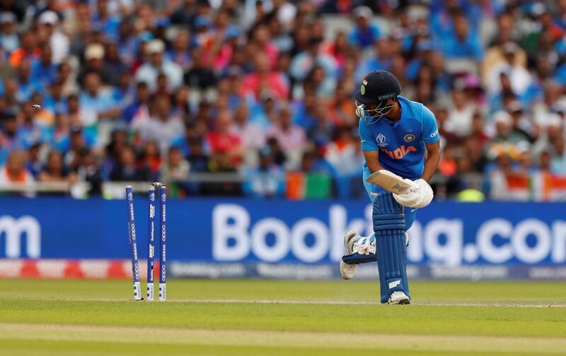 India's Bhuvneshwar Kumar loses his wicket. Reuters