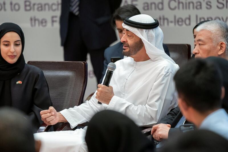 BEIJING, CHINA - July 23, 2019: HH Sheikh Mohamed bin Zayed Al Nahyan, Crown Prince of Abu Dhabi and Deputy Supreme Commander of the UAE Armed Forces (C), attends the UAE-China youth symposium, at Tsinghua University. Seen with HE Shamma Suhail Al Mazrouei, UAE Minister of State for Youth Affairs (L).

( Rashed Al Mansoori / Ministry of Presidential Affairs )
---