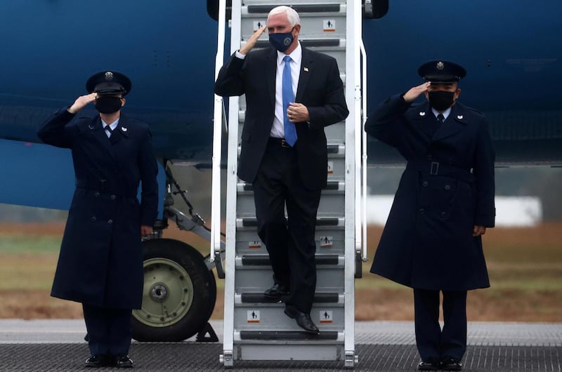 US Vice President Mike Pence disembarks Air Force Two at Hickory Regional Airport in Hickory, North Carolina, US. Reuters