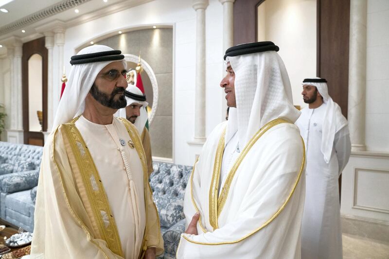 ABU DHABI, UNITED ARAB EMIRATES - June 15, 2018: HH Sheikh Mohamed bin Rashid Al Maktoum, Vice-President, Prime Minister of the UAE, Ruler of Dubai and Minister of Defence (R), speaks with HH Sheikh Hazza bin Zayed Al Nahyan, Vice Chairman of the Abu Dhabi Executive Council (R), during an Eid Al Fitr reception at Mushrif Palace. 


( Mohamed Al Hammadi / Crown Prince Court - Abu Dhabi )
---