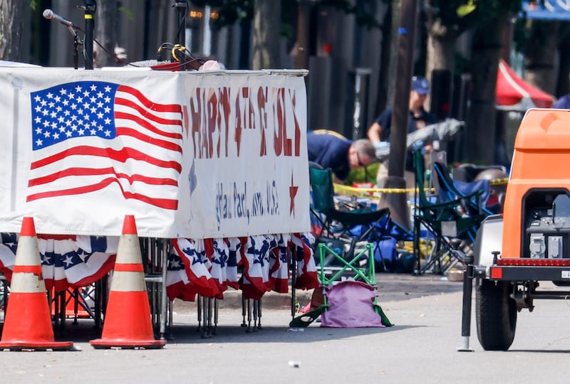 Law enforcement officers continue their investigation at the scene of a mass shooting at a July 4 celebration and parade in Highland Park, Illinois. EPA
