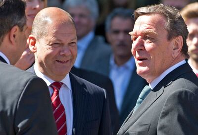 Critics said the reprieve for Mr Schroeder, right, reflected poorly on the party of current Chancellor Olaf Scholz. AFP 