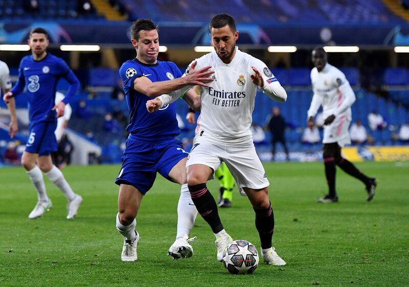 FILE PHOTO: Soccer Football - Champions League - Semi Final Second Leg - Chelsea v Real Madrid - Stamford Bridge, London, Britain - May 5, 2021 Chelsea's Cesar Azpilicueta in action with Real Madrid's Eden Hazard REUTERS/Toby Melville/File Photo