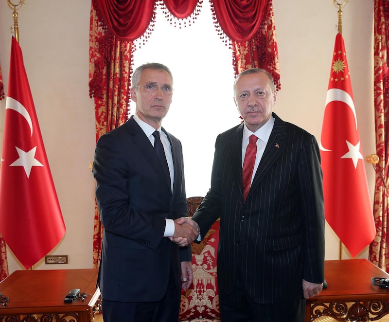 epa07913174 A handout picture provided by Turkish Presidential Press office shows Turkish President Recep Tayyip Erdogan (R) shaking hands with NATO Secretary General Jens Stoltenberg (L) during their meeting in Istanbul, Turkey, 11 October 2019. Stoltenberg arrived in Istanbul following a visit to Rome for security concerns over Syria, after Turkey had launched an offensive targeting Kurdish forces in north-eastern Syria, days after the US withdrew troops from the area.  EPA/TURKISH PRESIDENCY HANDOUT  HANDOUT EDITORIAL USE ONLY/NO SALES