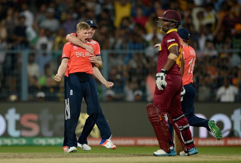 England's Joe Root celebrates dismissing Johnson Charles of the West Indies. Getty
