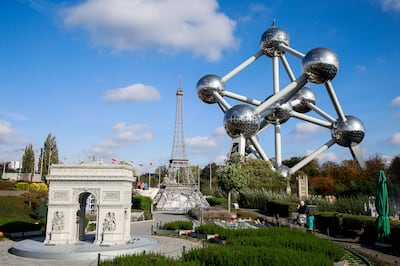 The Belgian Atomium, right, next to reproductions of the Eiffel Tower and Arc de Triomphe at the Mini-Europe amusement park in Brussels. EPA