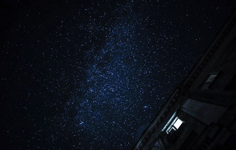 A lighted window and a night sky bright with stars seen as the street lights are switched off in Mykolaiv, Ukraine.  Scheduled power cuts were introduced in Kyiv, power operator Ukrenergo said, following the Russian destruction of Ukrainian power stations.  Russian troops on 24 February entered Ukrainian territory, starting a conflict that has provoked destruction and a humanitarian crisis. EPA