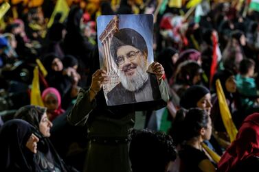 Poster of Hezbollah leader Hassan Nasrallah during a rally in Beirut 31 May 2019. The group sought to portray new US sanctions against three senior Hezbollah figures, including two MPs, as an affront to Lebanon. EPA