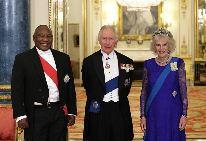 Cyril Ramaphosa, King Charles and Camilla, Queen Consort pose for a photograph during the State Banquet. AFP