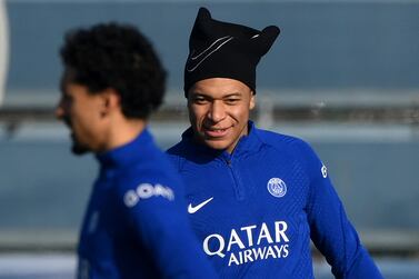 Paris Saint-Germain's French forward Kylian Mbappe takes part in a training session in Saint-Germain-en-Laye, west of Paris on February 13, 2023, on the eve of the UEFA Champions League round of Last 16 First leg football match against FC Bayern Munich.  (Photo by FRANCK FIFE  /  AFP)