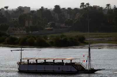 An old Nile Cruise boat sails along the Nile River in Luxor, Egypt October 27, 2019. REUTERS/Amr Abdallah Dalsh