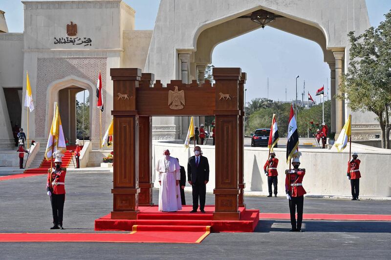 Pope Francis arrives at the Presidential Palace in Baghdad. AFP