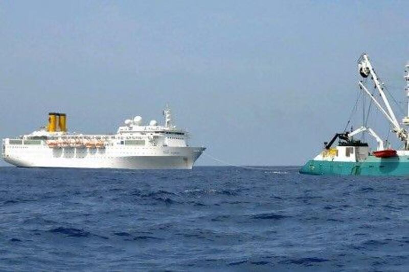 The Trevignon, a French fishing vessel, tows the Costa Allegra, drifting powerless in the Indian Ocean, to the Seychelles.