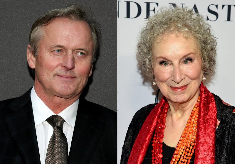 Author John Grisham attends the opening night of "A Time To Kill" on Broadway in New York on Oct. 20, 2013, left, and author Margaret Atwood attends the Glamour Women of the Year Awards in New York on Nov. 11, 2019. Atwood and Grisham are among several authors participating in a novel about the pandemic. The Authors Guild Foundation announced Thursday that it had reached a deal with Houghton Mifflin Harcourt Books & Media to publish â€œFourteen Days: An Unauthorized Gathering." (AP Photo)