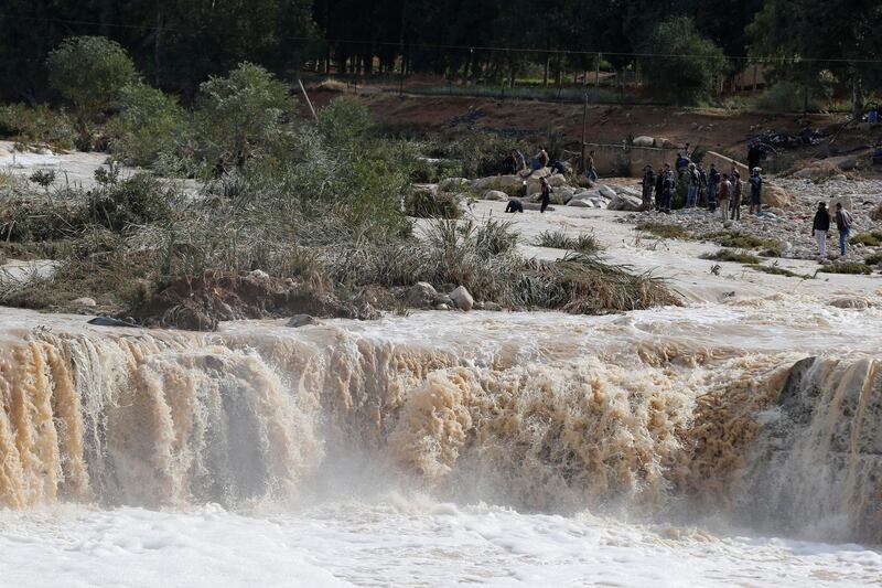 Civil defence members look for the missing. Reuters