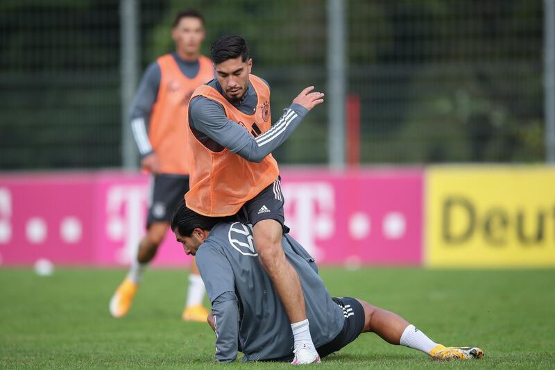 Emre Can tackles Suat Serdar during a training session at ADM-Sportpark ahead of Germany's Uefa Nations League group stage match against Spain. Getty Images