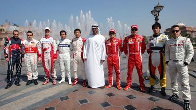 President Sheikh Mohamed, who was Crown Prince of Abu Dhabi at the time, with Formula One drivers in front of Emirates Palace hotel