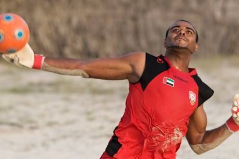 Goalkeeper Mohammed Hamza and the UAE beach football team will host Belarus and Oman in a friendly tournament this week. Jeff Topping / The National