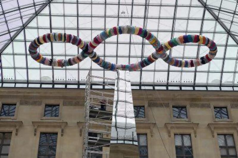 The sculpture, Obelisk and Third Paradisio, is set up at the Louvre Museum in Paris.