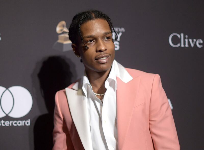 FILE - This Feb. 9, 2019 file photo shows A$AP Rocky at Pre-Grammy Gala And Salute To Industry Icons in Beverly Hills, Calif.  Prosecutors in Sweden are dropping the investigation of a man they say was involved in a fight with American rapper A$AP Rocky. The platinum-selling, Grammy-nominated artist whose real name is Rakim Mayers, has been behind bars since early this month as police investigate the fight in Stockholm.(Photo by Richard Shotwell/Invision/AP, File)