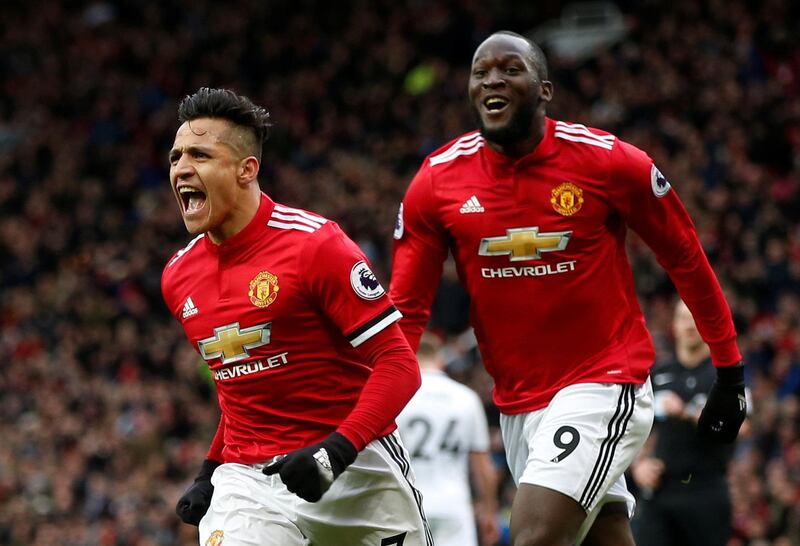 Soccer Football - Premier League - Manchester United vs Swansea City - Old Trafford, Manchester, Britain - March 31, 2018   Manchester United's Alexis Sanchez celebrates scoring their second goal with Romelu Lukaku   REUTERS/Andrew Yates    EDITORIAL USE ONLY. No use with unauthorized audio, video, data, fixture lists, club/league logos or "live" services. Online in-match use limited to 75 images, no video emulation. No use in betting, games or single club/league/player publications.  Please contact your account representative for further details.