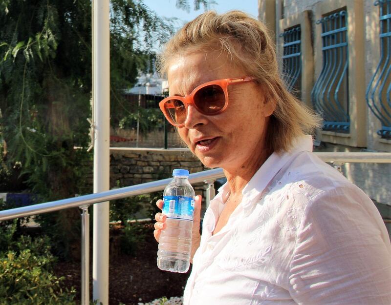 (FILES) In this file photo obtained from the Ihlas News Agency on July 26, 2016 shows journalist Nazli Ilicak posing in Mugla after being detained by Turkish police.
 A Turkish court on February 16, 2018 jailed three prominent journalists for life on charges of links to the group blamed for the 2016 failed coup, state media said. Veteran journalists and writers Nazli Ilicak and the brothers Mehmet and Ahmet Altan were handed the life sentences at a trial in Istanbul over links to the outlawed group of US-based preacher Fethullah Gulen, the Anadolu news agency said. A similar punishment was handed to three other suspects.
 / AFP PHOTO / IHLAS NEWS AGENCY / IHLAS NEWS AGENCY