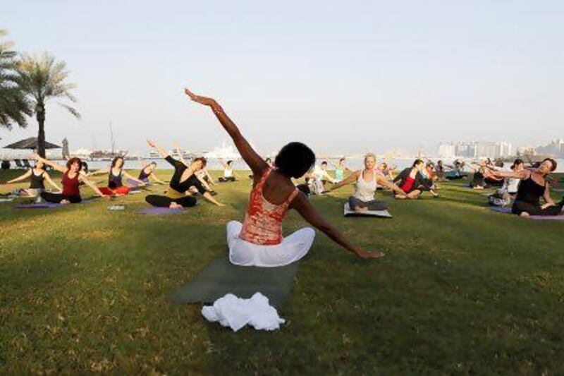 Angela Pashayan leads an early-morning yoga class on the second day of the Dubai Yoga and Music Festival. Sarah Dea / The National