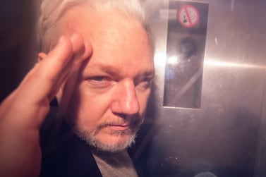 WikiLeaks founder Julian Assange leaving court in a prison van in May. EPA