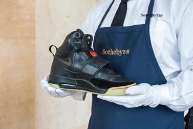The Nike Air Yeezy 1s worn by rapper Kanye West sold for $1.8 million, triple the previous record for sneakers. AFP