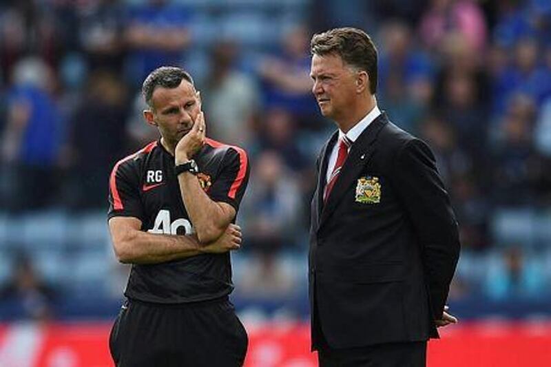 Ryan Giggs and Manchester United coach Louis Van Gaal in discussion prior to the the Barclays Premier League match between Leicester City and Manchester United at The King Power Stadium on September 21, 2014 in Leicester, England. (Photo by Mike Hewitt/Getty Images)



