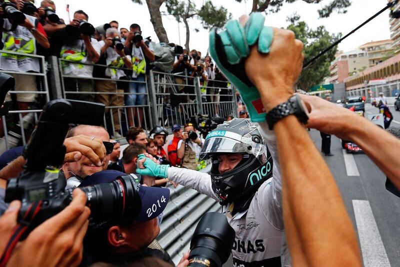 Mercedes driver Nico Rosberg celebrates after winning the Monaco Grand Prix on Sunday. Valdrin Xhemaj / EPA / May 25, 2014