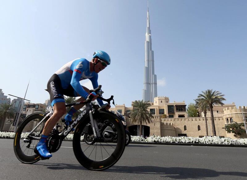 US cyclist Tyler Farrar rides past the Burj Khalifa during the 2014 Dubai Tour. Karim Sahib/AFP