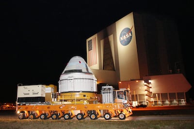 A Boeing CST-100 Starliner spacecraft is rolled out in the pre-dawn hours past the Vehicle Assembly Building at the Kennedy Space Centre in Cape Canaveral, Florida, on April 16. AFP