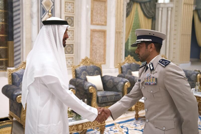 ABU DHABI, UNITED ARAB EMIRATES - May 20, 2018: HH Sheikh Mohamed bin Zayed Al Nahyan Crown Prince of Abu Dhabi Deputy Supreme Commander of the UAE Armed Forces (L), receives HH Sheikh Mohamed bin Tahnoon Al Nahyan (R), during an iftar reception at the Presidential Palace. 

( Hamad Al Kaabi / Crown Prince Court - Abu Dhabi )
---